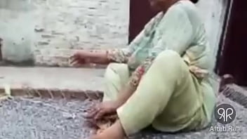 Sultry Desi Auntie Puffing On A Cigarette